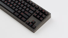 Load image into Gallery viewer, GMK CYL Slasher on a smoke NK87 zoomed in on right