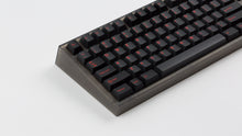 Load image into Gallery viewer, GMK CYL Slasher on a smoke NK87 zoomed in on left