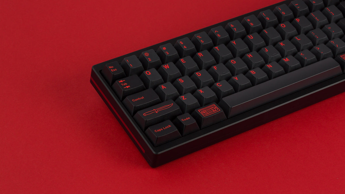  GMK CYL Slasher on a black keyboard zoomed in on left 