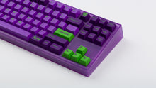 Load image into Gallery viewer, GMK CYL Terror on a purple NK87 zoomed in on right