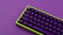Load image into Gallery viewer, GMK CYL Terror on a green keyboard zoomed in on left
