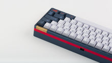 Load image into Gallery viewer, GMK CYL Trackday on a blue keyboard back view right side