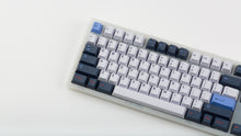 Load image into Gallery viewer, GMK CYL Trackday on a translucent NK87 keyboard zoomed in on left