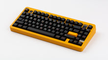 Load image into Gallery viewer, GMK CYL Tribal on a yellow Matrix MRTAXI angled