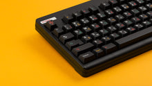 Load image into Gallery viewer, GMK CYL Tribal on a Based Black CLASSIC-TKL close up on left side angled