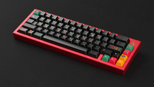 Load image into Gallery viewer, render of GMK CYL Tribal on a red keyboard angled