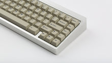 Load image into Gallery viewer, GMK CYL Winkler on a silver keyboard close up on right side angled