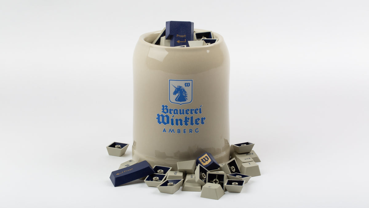  GMK CYL Winkler keycaps in the included .5 liter stein 