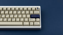 Load image into Gallery viewer, GMK CYL Winkler on a white Keycult No. 1 close up right side