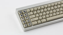 Load image into Gallery viewer, GMK CYL Winkler on a silver keyboard close up on left side