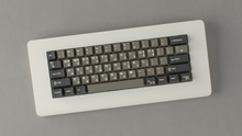 Load image into Gallery viewer, render of GMK CYL Dolch R5X on a cream keyboard