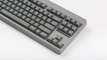 Load image into Gallery viewer, GMK CYL Hooty on a CLASSIC-TKL Regolith keyboard close up on right side angled