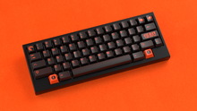 Load image into Gallery viewer, render of GMK CYL Kaiju R3 Kaiju Dark on a black Atom keyboard angled