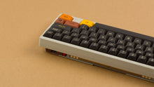 Load image into Gallery viewer, MTNU 800 on a Beige keyboard back view angled right side