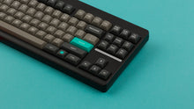 Load image into Gallery viewer, MTNU Dolch on a Black Classic TKL Keyboard  close up on right side