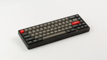 Load image into Gallery viewer, MTNU Dolch on a Black Keyboard  angled