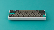 Load image into Gallery viewer, MTNU Dolch on a White Keyboard back view