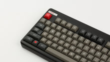 Load image into Gallery viewer, MTNU Dolch on a Classic TKL Keyboard close up on left side