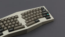 Load image into Gallery viewer, MTNU Dolch on a Beige Type K Keyboard close up on right side