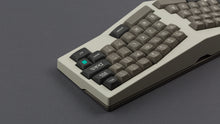 Load image into Gallery viewer, MTNU Dolch on a Beige Type K Keyboard close up on right side back view