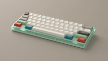 Load image into Gallery viewer, render of GMK Foundation on a green beetle60 keyboard angled with MTNU caps