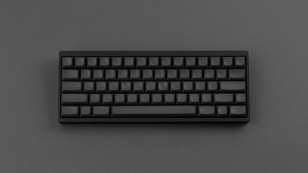  MTNU Graphite on a black and red keyboard top down view 