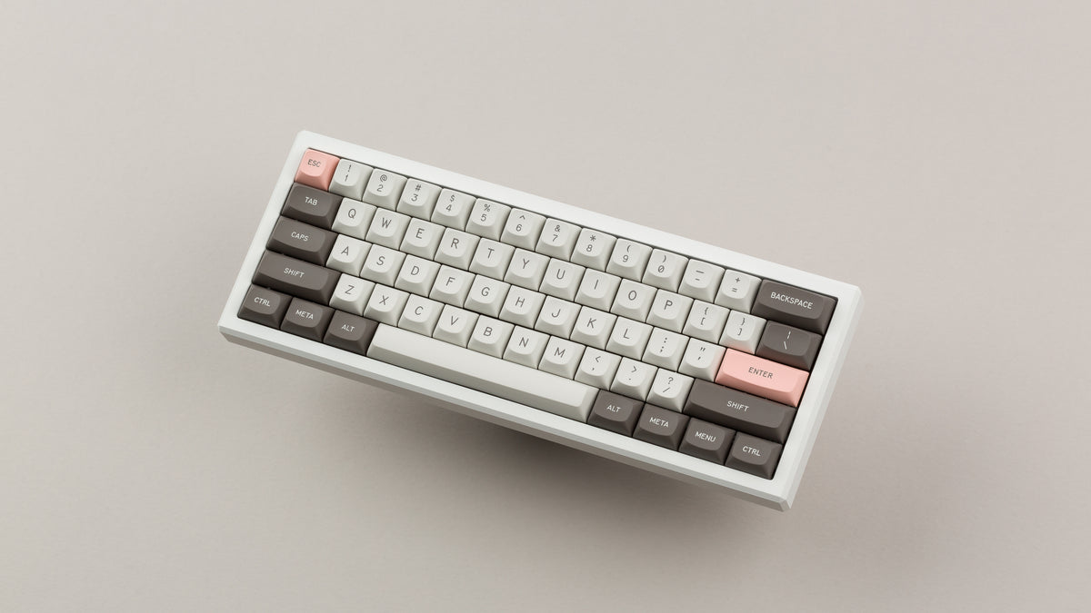  GMK MTNU R&D 1973 on a white keyboard floating 