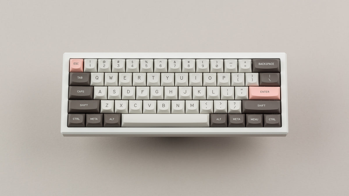  GMK MTNU R&D 1973 on a white keyboard top down view floating 