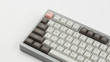 Load image into Gallery viewer, GMK MTNU R&amp;D 1973 on a silver keyboard close up on left side