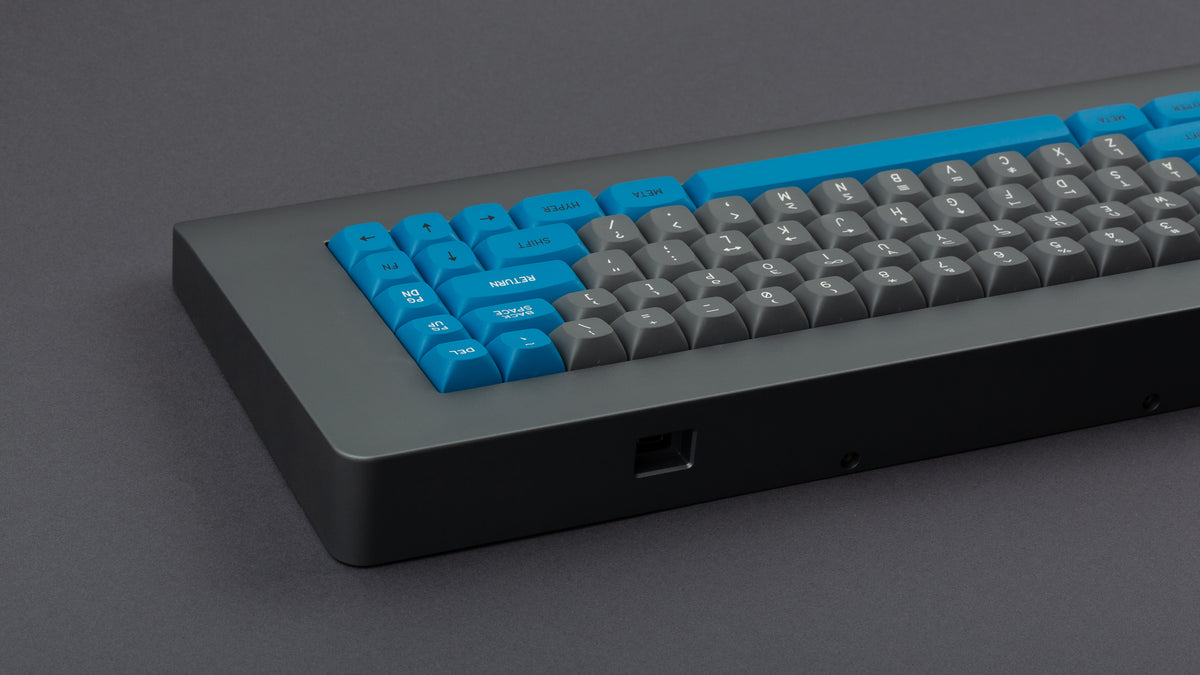 GMK MTNU Space Cadet on a grey keyboard back view of right side 