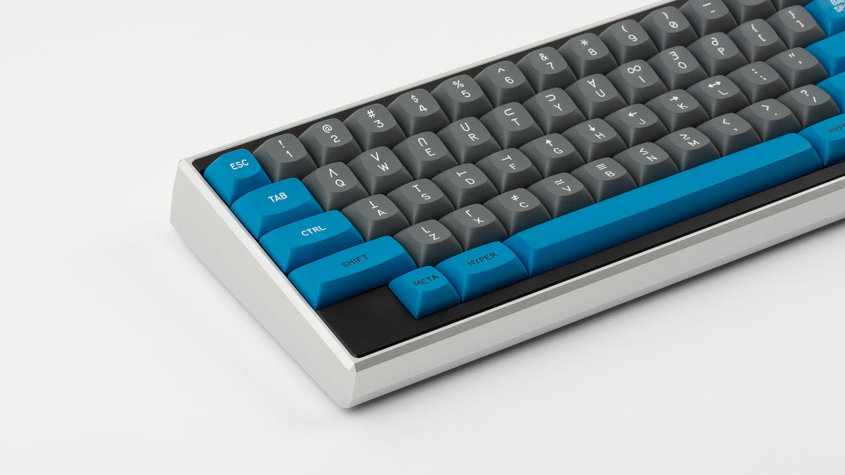  GMK MTNU Space Cadet on a silver Keycult Zero keyboard with black accent bars close up on left side angled 
