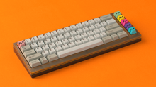 Load image into Gallery viewer, Render of GMK Centinela Essentials keycaps on a silver Minerva keyboard, angled view