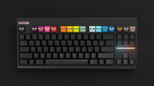Load image into Gallery viewer, Render of GMK Centinela Fan Favorites keycaps on a compact TKL keyboard, angled view