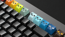 Load image into Gallery viewer, Render of GMK Centinela Fan Favorites keycaps on a compact TKL keyboard, alternate angle