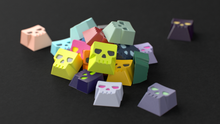 Load image into Gallery viewer, Render of GMK Centinela Fan Favorites keycaps on a cluster numpad, angled view