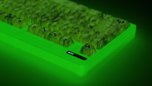 Load image into Gallery viewer, render of GMK CYL Mutagen on a CLASSIC-GLO keyboard back view close up on left side glowing in dark