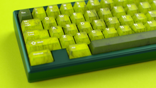 Load image into Gallery viewer, render of GMK CYL Mutagen on a green Keycult Zero close up on left side 