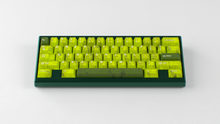 Load image into Gallery viewer, render of GMK CYL Mutagen on a green Keycult Zero