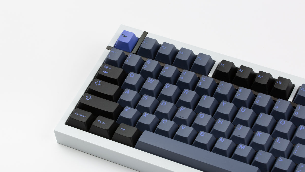  GMK CYL Nightshade on a white BOX 75 keyboard close up on left side 