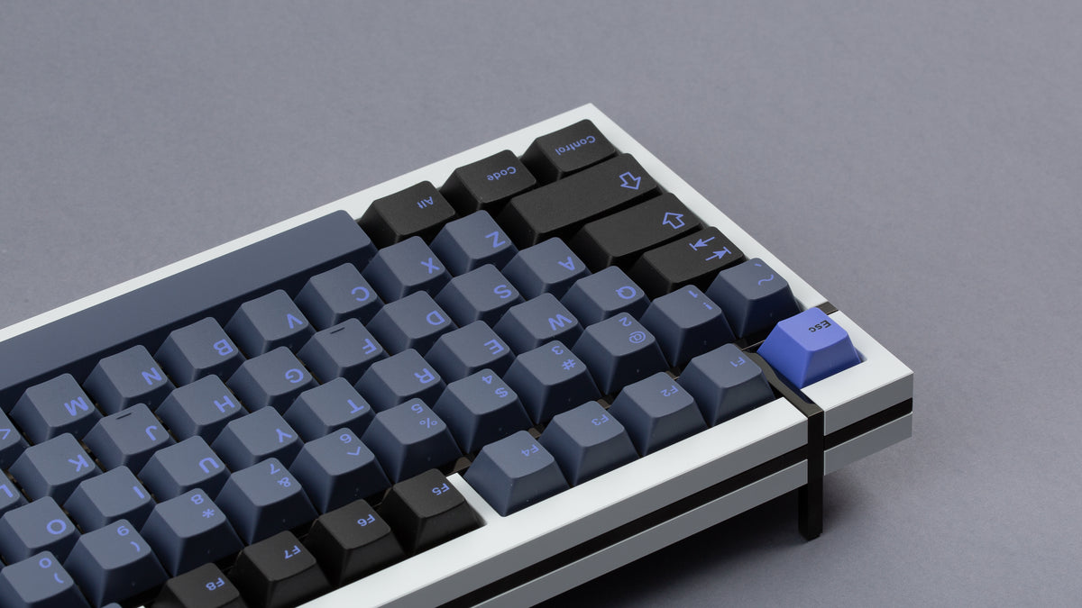  GMK CYL Nightshade on a white BOX 75 keyboard back view close up on left side 