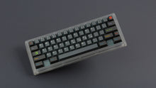 Load image into Gallery viewer, GMK Oblivion V3.1 on a clear keyboard angled
