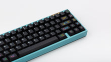 Load image into Gallery viewer, GMK CYL Polybius on a blue keyboard close up on right side