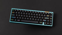 Load image into Gallery viewer, GMK CYL Polybius on a blue keyboard angled