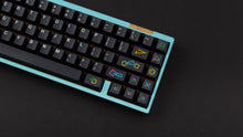 Load image into Gallery viewer, GMK CYL Polybius on a blue keyboard close up on right side angled