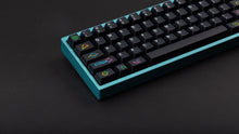 Load image into Gallery viewer, GMK CYL Polybius on a blue keyboard close up on left side angled