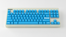 Load image into Gallery viewer, render of Unobtanium Blue on a CLASSIC GLO keyboard