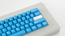 Load image into Gallery viewer, render of Unobtanium Blue on a Piggy keyboard close up on the right side