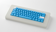 Load image into Gallery viewer, render of Unobtanium Blue on a Piggy keyboard