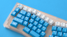 Load image into Gallery viewer, render of Unobtanium Blue on a Rikia keyboard close up of left side on a blue background