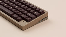Load image into Gallery viewer, taupe lily closeup or right side with brown keycaps